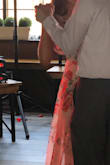 This dress was gorgeous at a Cinco de Mayo wedding last week! I originally bought the XS, but it was too tight to finish the zip up. The size small zips perfectly, but I'm a small bust and it is roomy and low cut. The quality of this dress is perfect and the design of the floral is beautiful. Buy this! You'll love it! (I'm so embarrassed, the only photo I have of the dress on is of my husband and I dancing to "Shallow" from Lady Gaga's new movie at the wedding. You can see how the top layer is sheer and let's light in so beautifully though!!) - Jennifer L.