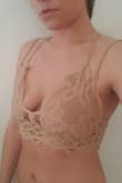 I ordered down a size and the fit was perfect. I'm between a 32B and a 34B and the XS was the right size. I have also had a baby so I feel like my breast tissue is not as firm as it use to be so I prefer a more of a snug fit to hold everything up. - Sarah F.