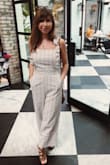 This outfit just reminds me of the most perfect beach day, sitting outside a restaurant with some drinks. My only complaint is it is a bit too long on me. But I normally have this issue with jumpsuits because I'm so short, only being 5'1". So I know it's not really their fault. I believe it's supposed stop a bit above your ankles but mine goes below. I got an x-small and it fits me great everywhere else, especially my chest and waist; slim fitting but very comfortable. It's also very easy to take on and off. I just love the style. I wore this out to brunch but I can't wait to wear it somewhere near the beach next! - Samantha C.