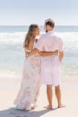 I could not have been happier with this dress. I used in it my engagement shoot and it fit perfectly, was so flattering, and went so well with our beach them. I'm over the moon with how our photos turned out, this dress was magical. - Aly K.
