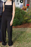 Great jumpsuit and bra friendly! Thick fabric with good stretch and recovery. Tight in the midsection as pictured on the model. Would definitely need to be hemmed for a more petite woman -- I am 5'9 with long legs and it was floor length! - OIivia H.