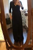I usually don't do reviews, but all the the reviews on this site have been SO helpful for me! Thank you to those who have posted! This dress is very fitted, but super comfortable. It does show all the curves... Wore spanks to hide the love handles. I had to get it hemmed, like every other long dress I own, but other than that it fits perfect. The material is super comfy and the cut on it is really nice. Would highly recommend. Especially if your really thin with no love handles lol. - Michelle