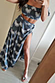 This fits true to size and is a perfect outfit for a vacation. I got a lot of compliments wearing it. I would recommend it for a fun night out. - Kimberley O.