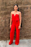 This jumpsuit is by far one of my favorites that I've ever purchased. I bought this to wear on my birthday for a night out and I received so many compliments from friends and strangers. I'm 5'6" and wore 3 inch heels with it and the legs were still a little long on me, but it still looked great. I highly recommend this jumpsuit. - Erin D.