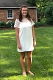 A beautiful dress that showed just a hint of skin and has embellishments that are right on point.  The fabric had body and enough sheen for special occasions. - Jennifer P.