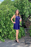 At first I thought this dress was going to be short but it wasn't. It's a very nice dress you can use for any occasion and I totally love the back! - Priscilla V.