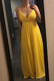I bought this dress for my sister's wedding. The color is beautiful and fitted perfectly. the skirt is beautiful and full of movement. I am so exited to wear to the party! - Julieta J.