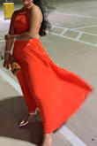The body fit well, but as a petite person, I had to get it hemmed. The fabric was the perfect weight and had a swirly quality perfect for dancing! - Nom H.