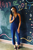 Normally I struggle with jumpsuits because of my height but this fit perfectly! I wore it for my RN pinning ceremony and received many compliments. The material was very comfortable and the wrinkles came out easily with my mini steamer! So happy with my choice! - Jay B.