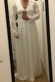 Ordered this dress to wear for an upcoming beach elopement but sadly, it just wasn't the right fit in either a small or a medium. I have an athletic build and tend to be between a 6/8 or S/M, but either way this dress just didn't work on my body. Because of how short I am, I knew I'd have to get it hemmed either way which is not a problem. The medium was loose and gappy in the back, sleeves too loose and long, but fit well in the waist. The small was a bit tight in the waist, didn't sit right on my shoulders and my back seemed to be pulling the opening apart TOO much. Sleeves were again too long for me in the small. (First photo is the small, second photo is the medium). - Bethany H.