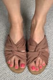 I love these sandals and bought them in two colors. They feel like you're wearing slippers because the foot-bed is actually quite padded... but look like you've made the effort! Can be dressed up or down. - Katherine C.