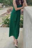 I wore this to one of my graduation ceremonies. I risked it & got the XS, it was a bit tight at my waist, but nothing intolerable. However, if you're having a big dinner while wearing it, I would stick to regular sizing. I order XS so length wouldn't be so much of an issue. - Melissa G.