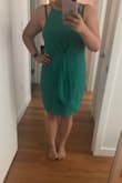 I am a 36D and usually a dress size 12 because of my chest size (my pants are usually a size 8). The XL fit a little loose in the chest area, but I would not size down because there is no give in the fabric at all. The material is as expected and its beautiful. Looks exactly as pictured. A little less "shape" with the center seam than I expected but will keep! - Meagan L.