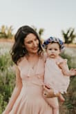 I wore this dress for mommy and me photos and was so in love. It photographed beautifully and was the perfect feminine, whimsical dress.
Note, the dress is nice and long so you can hem or wear with heels for the perfect fit. - Amanda D.