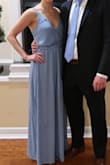 I picked this dress for a wedding because I liked the slate blue color and I have never gotten so many compliments! This is a perfect dress for any formal event, or you could even dress it down if you want to. It is very light weight and comfortable. The only downside is that the chest area was a bit large and low cut. To fix that, all I had to do was put some fashion tape down and I was good to go all night! You could wear a strapless bra with it, but since the back is very open, you'd be able to see the bra straps. Also, ironing or steaming is a must since the material wrinkles very easily. Overall- very beautiful and simple dress. I want to order this in more colors! - Ashley S.