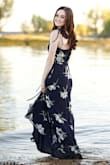 I LOVE this dress, it is so cute! I wore it for my senior pictures and the dress looked exactly as I had pictured it would. It is quite long but I didn't get it gemmed because it worked for my pictures. I ordered a small and I probably could have gotten away with an XS because it is adjustable. Definitely recommend this! - Jessica C.