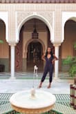 Loved the jumpsuit, light and airy but not see through. Comfortable. I have long legs so the legs of the suit ended above my ankles. I wore this on vacation where temps were above 100 degrees and I was very happy with my choice. The halter top makes it easy to personally adjust to your fit. - Joy J.