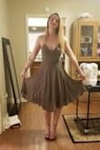 I can't praise this dress enough. Super cute. Super comfy. Love the olive color. However it does wrinkle real easily, but that's nothing that few minutes in the dryer won't fix! - Ana I.
