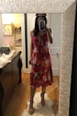 I originally ordered a medium (I'm always between sizes), and I ended up exchanging for a small. I love the style & fit of this. It's perfect for summer weddings! - Michelle L.