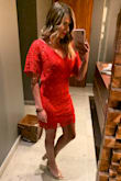 I wore this for my birthday in Mexico and loved it! It was a great fit. The only issue was zipping it. Where the material changes it was extremely difficult to zip. - Jenna H.