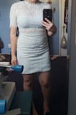 Ok so this was a weird one for me. I'm usually a medium but that size was out of stock. I loved it so much that I ordered a small. It actually fit! It was a little tight on me but it wasn't uncomfortable. If you're usually a small, this dress might be fit loose - unless you have curves or you're tall. 

The only thing I didn't like about it is that it's long and I'm not very tall. I tried to roll it up and it looked better on me that way. - Yenifer R.