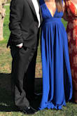 Bought this dress in royal blue to wear to black tie weddings. First, love the color because it can be worn for any season. Second, fit nearly perfectly except the shoulder straps were too long and I had to get them taken in about 2 inches so they didn't slip down - but worth it for the price of the dress! The fabric is float and light, but not cheap-looking. And I didn't need to wear a bra, just some boob tape around the chest, or sticky boobs would work. So happy with my purchase and may even buy in another color! - Ariel S.