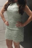 Love the fit of the dress! Great material. This dress does not have any give too it. It looks very tailored on. I am a very curvy girl so it was a little more snug for me in my hip sand loose in my stomach. This dress is also very short on. - Karysta S.