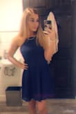This dress fit me perfectly. I wore it to a wedding. It hit me at mid thigh and the adjustable straps in the back are a huge plus! Wrinkles easily when you are sitting down but hardly visible with how flowy the dress was. Flattering fit. Would recommend. - Breonna L.