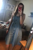 I bought a Medium because I am bigger in the chest area and I was scared of the buttons popping off, or looking as if they are about to pop off. It is a little big in the waist, so If i were to get it fitted that is the only thing I would change. I'm a pretty tall girl, and even on me the dress comes to my knees so If you're shorter, it will definitely be a longer fit. Aside from the big buttons, there are also tiny clasp buttons between the big ones to ensure security. There is not padding, so I would definitely recommend a strapless bra, or pads. It's great for the summer time, I would recommend! (Came in a little wrinkly and I couldn't find an iron). - Tijana G.