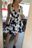 I bought this dress for my college graduation, and I was pleasantly surprised by how well it fit! There were only x-smalls left and I am typically a small, but I ordered it anyway. Thankfully I did because the x-small fit perfectly! The material is quality, the length is perfect (I'm 5'9 so dresses are usually short on me), and the v-cut shows just enough cleavage. Overall, love this dress! :) - Taylor B.