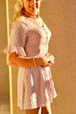 What a nice fitting, comfortable button-up dress. I only have to deal with two or three buttons, as I can step right into Captivate my Heart Pink Print Dress. Tie the attached thin back belt, for a form fit, into a permanent cute bow, and it's so good to GO! Another sweet buy, just in time from Lulus online. You had me at "Heart Pink Print"! - Bobby R.