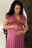 I used my dress for a maternity shoot, and it looked beautiful on me. I was skeptical at first, but when everyone saw it on they loved the way it looked. I felt very confident with my big belly and all. I actually felt sexy when the entire look was finished. - Aliuska S.