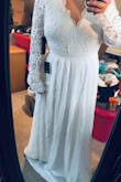 Absolutely love this dress, ordered it for my wedding next September and it fits perfect and makes me feel beautiful. The back is absolutely stunning. - Samantha C.