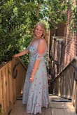 I love this dress! I wore it to my rowing banquet and anniversary meal! It fits lovely, I read other reviews and sized up to a large but it fit perfectly as a large! It was a great length and was beautiful. My favorite dress of all time! I recommend buying it!!! - Alice T.