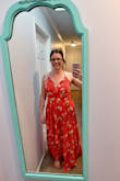 This dress is so bright and colorful! Perfect for a summer wedding and a vacation in Hawaii! Very lightweight. I may have to tack the front only because I don't really have enough bust to fill! I bought a large and I wouldn't say it's too big, but it's on the verge. However, I'm not sure I would be able to get a medium zipped! - Ashley T.