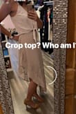 I am not a fan of the hi-low styles, but this asymmetrical hem was so cute! I ordered it with the crop top and loved it! I went with a large, but I'm sure a medium would have worked as well! - Laura W.