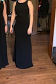 I bought this for a wedding that I am in in February and it's perfect! The material is heavier and thick so it's appropriate for cold weather. It is also a little stretchy so it'll be comfortable to wear all day and dance in all night - Danielle J.