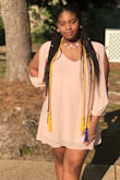 We purchased this dress for Class Day and not only is it classy, but it's beautiful and flowy. Definitely a winner and appropriate for so many occasions. - Emosha W.