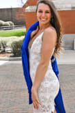 I at first didn't want to buy the dress due to the price, but I'm so glad I did! The length is perfect and so is the v-neck cut! I don't have big boobs, but the top fit perfectly! I had so many compliments on my dress and felt so cute for graduation! Not to mention it made my butt look great so I can't complain hahaha. All around great dress. - Kellie W.