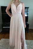 Absolutely love it. Perfect for prom, the back is beautiful and it's the perfect color. Feels very well made. - Madison M.