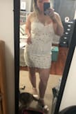 I'm so happy with this dress!! I was worried a large might be too small because it's such a tight fit, but it's perfect. It's very true to size! I can't wait to wear this to graduation. :) - Darby W.