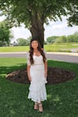 It is beautiful and received rave reviews at my bridal shower! Would definitely recommend... was a little tight, but probably still looked better than getting a larger size. Def would recommend for any special occasion! - Michelle P.