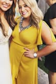I was looking for a dress to wear to a May wedding, something bright, light, and flowy; this was perfect! I'm very short so I did have to get some length hemmed but other than that the fit was comfortable and classy. The color was more mustard then a golden yellow as pictured above, but still very close. My waist is my problem area and I felt is complimented me perfectly because it's a wrap dress. There was even someone at the wedding wearing THE SAME DRESS! Color and everything. Highly recommend! - Megan P.