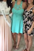 This dress is super flattering on my more hourglass like figure. I wore it to my high school graduation and a bridal shower and at both events everyone was complimenting it! The material is super comfortable, and I love the top lace detail. - Roxanna A.