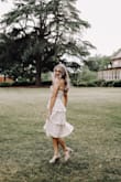 This is a beautiful dress! I ordered a size small and it fits perfectly. I can't wait to wear it to my college graduation! - Alexis D.