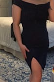 I loved this dress! Perfect fit and super stretchy. Unfortunately I had to return because of the super high slit. I bought this for a wedding, but I felt the slit was too revealing. With every step the dress came up higher causing the slit to be even more revealing. I do think ordering a medium would have helped the issue, but I just decided to go with a different dress. Still a gorgeous and flattering dress! - Gabriela S.