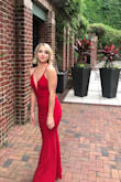 This dress won't let you down. I wore it to a gala and I got so many compliments. I felt like a celebrity it fit like a glove and was very comfortable. I ordered an XS and got it hemmed to fit my height. - Brittany B.
