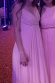 Very elegant yet simple dress, and a super cute color. Fits well and is pretty comfortable. - Cathryne S.