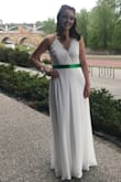 A few alterations, added some bling and a sash for prom. My daughter received so many compliments on her beautiful dress! - Meg S.