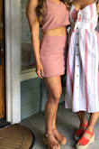 I love this! I was kind of nervous that the short skirt with the crop would be too much but it fit perfectly. The skirt wasn't too short for me. The material was easy to steam the wrinkles out of and it was comfortable. Perfect for summer and can mix and match with a pair of jeans or a bodysuit. - Angela W.